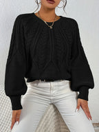 Afslappet kabelstrikket sweater, stående model