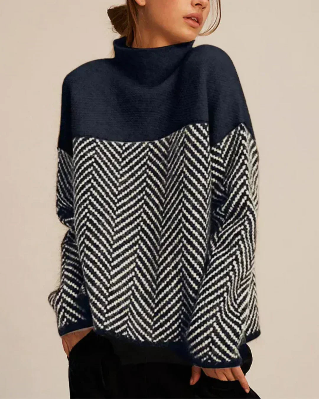 Rullekravesweater med Sildebensmønster, closeup af stoffet og syningen