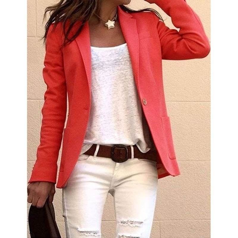 Blazer med Revers-Krave og Brystlomme i farven Orange, closeup af stoffet og syningen