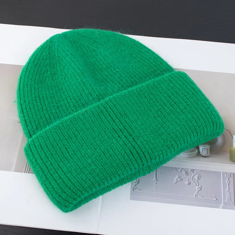 Fortykket hue med kunstpels til damer set bagfra – som accessory