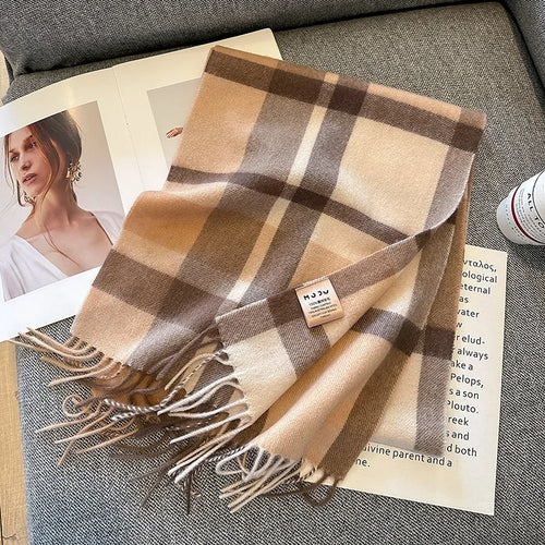 Australsk uldponcho, draperet løst om skuldrene