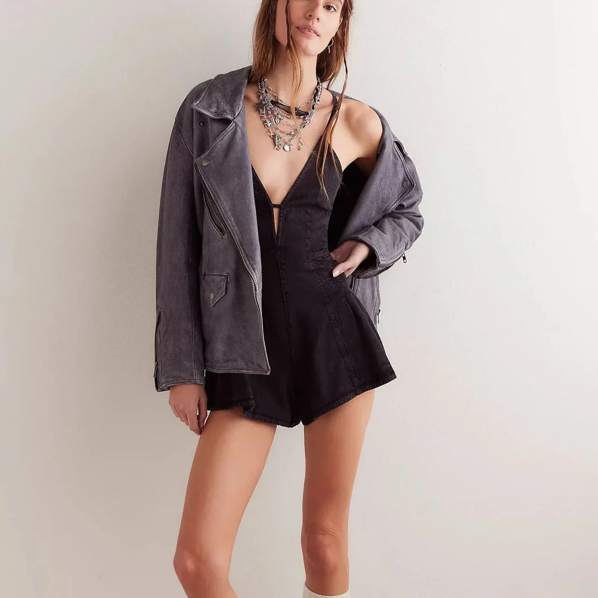 Plunge neck denim romper in Black