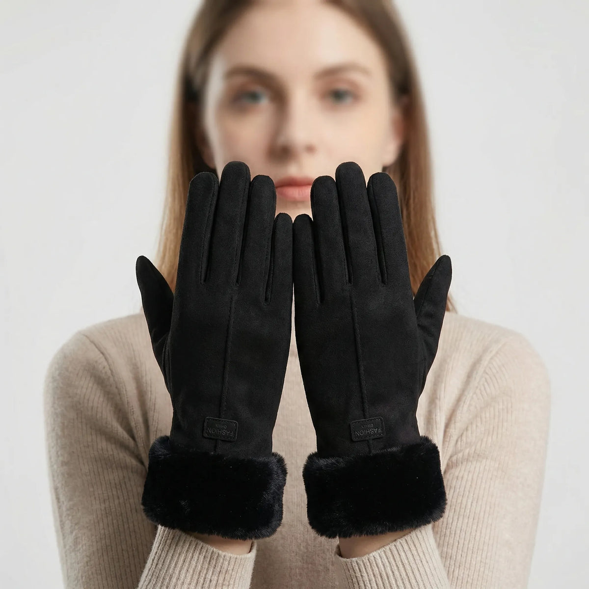 Vinterhandsker med plyskant, close-up af stoffet