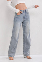 Slidte jeans til damer i grå denim set fra siden