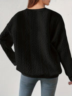 Teksturet kabelstrik-sweatshirt, styling til hverdag
