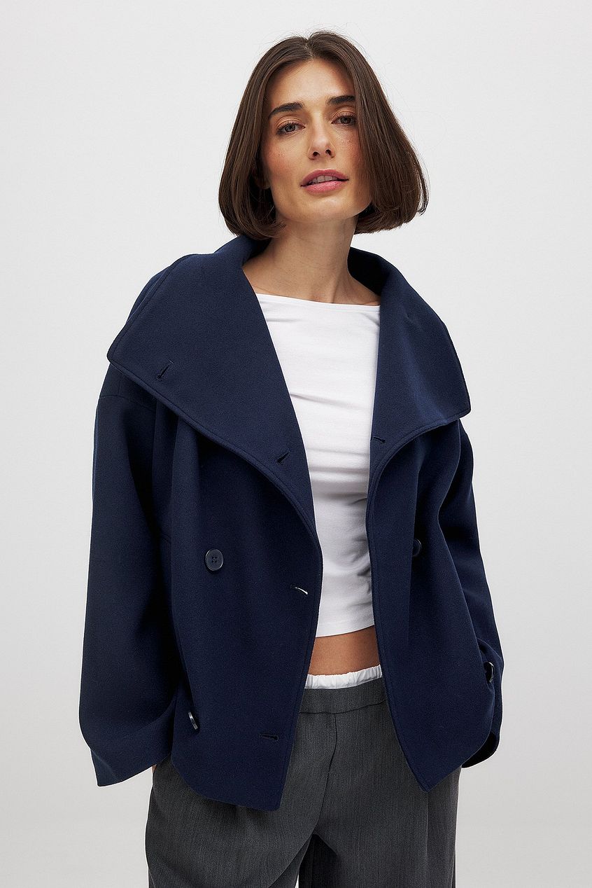 Dobbeltradet Trenchcoat, detalje af lukningen