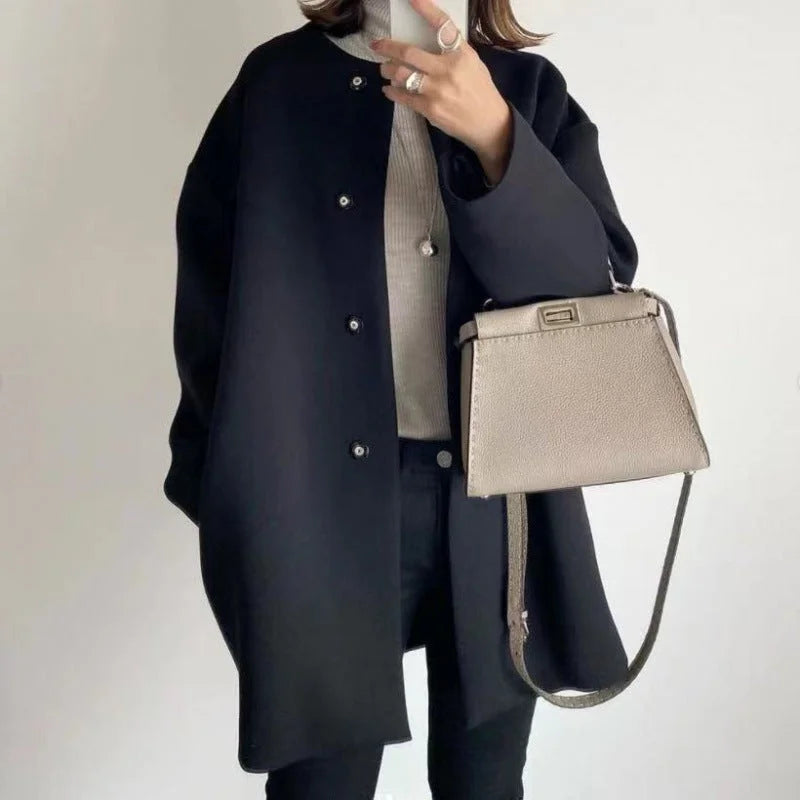 Elegant Oversized Vinterfrakke til Damer – set bagfra