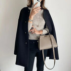 Elegant Oversized Vinterfrakke til Damer – stofdetalje