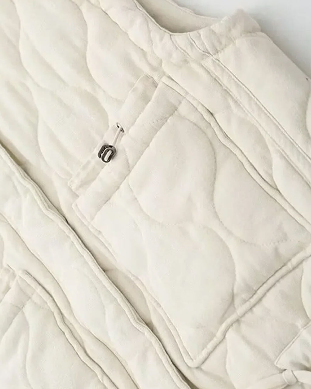 Bomuldsvest til damer i beige, str. M, set fra siden