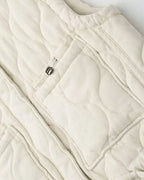 Bomuldsvest til damer i beige, str. M, set fra siden