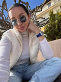 Strikket vest til damer i beige, detalje af lynlås