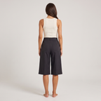 Black high-waisted tailored city shorts, back view
