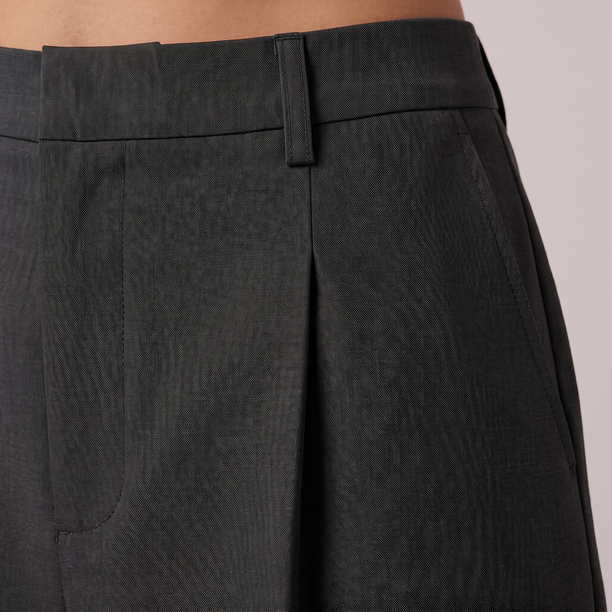Black tailored city shorts, fabric close-up
